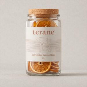Terane Orange dehydrated citrus garnish in a glass jar